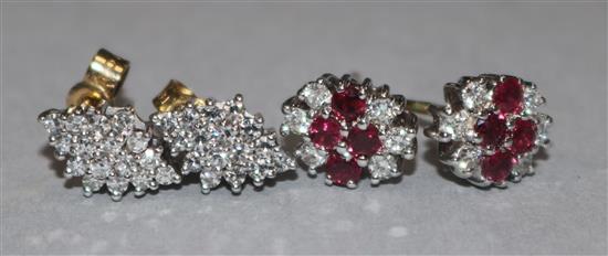 A pair of ruby and diamond cluster earrings; and a pair of lozenge-shaped diamond cluster earrings, both 18ct yellow gold settings